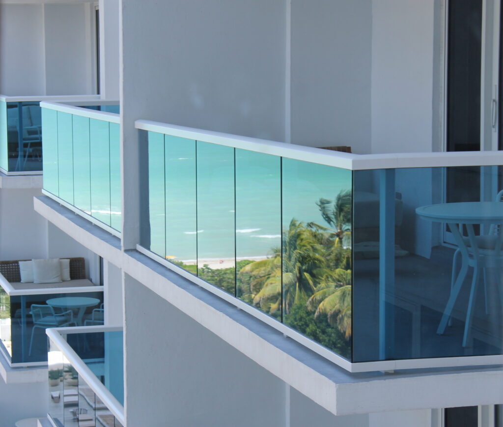 Ocean views reflected in the glass balconies at 1 Hotel South Beach