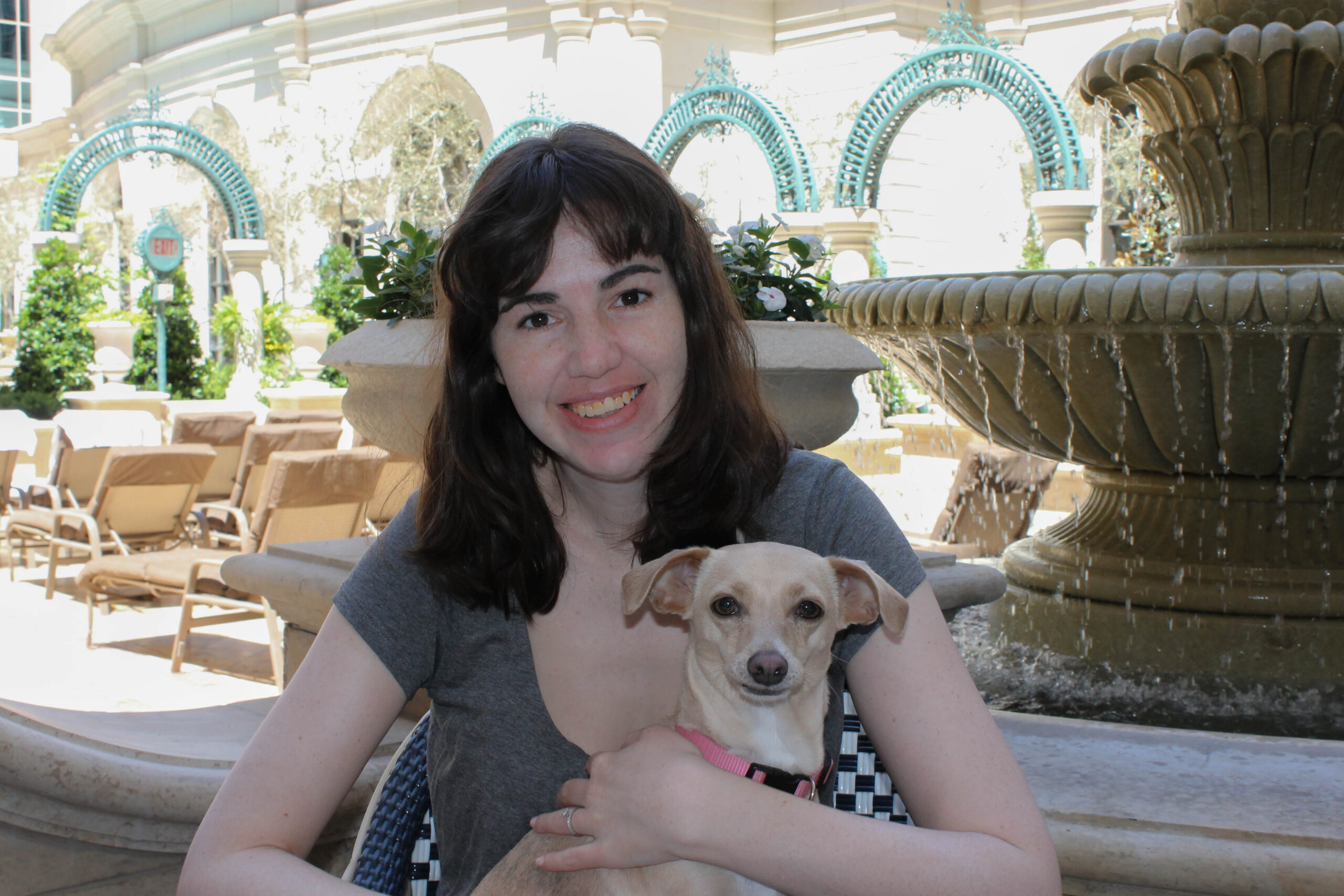 Dancer enjoying brunch at Bouchon, a dog-friendly restaurant on the Las Vegas strip with a charming outdoor patio 