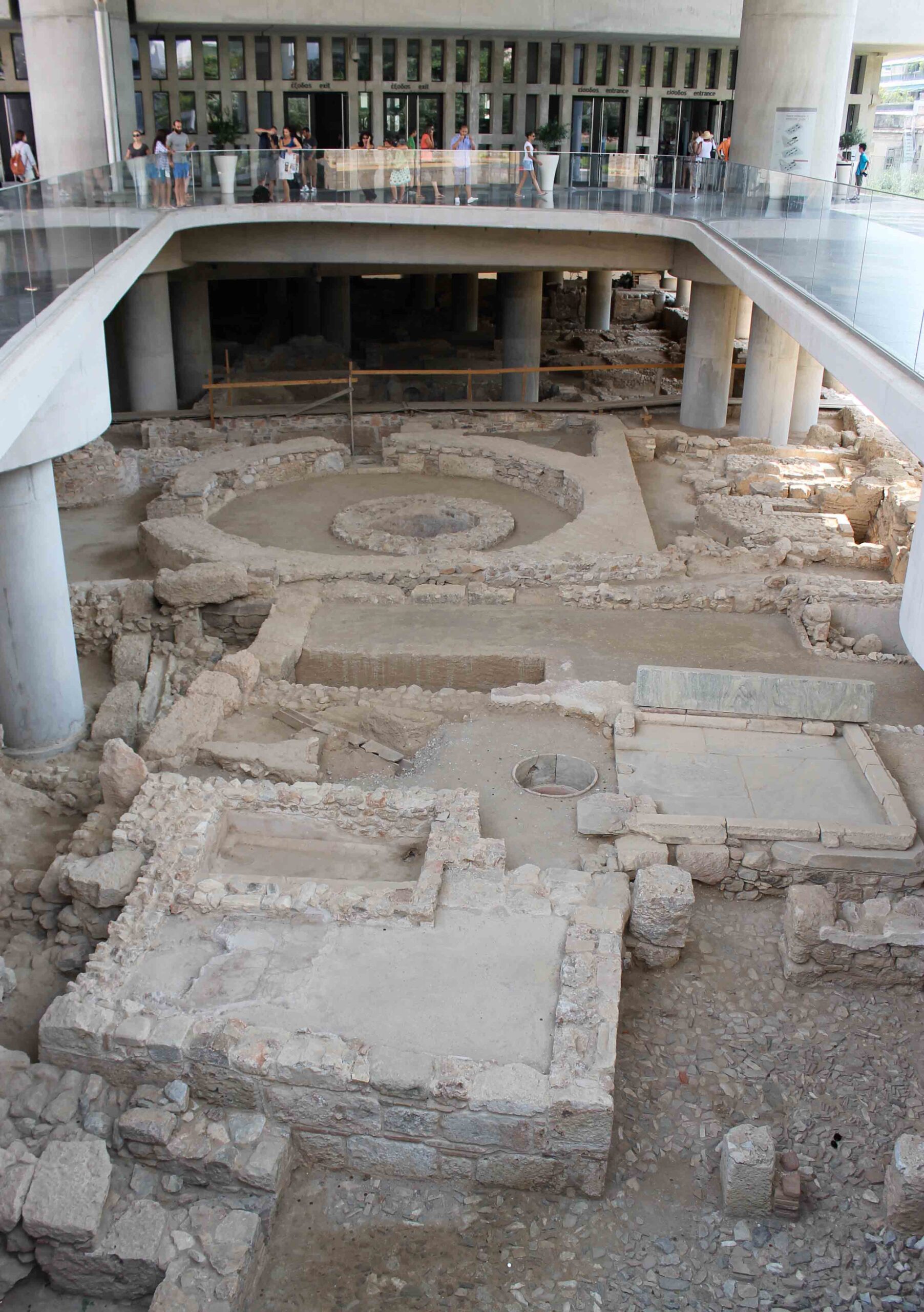 Ancient parts of Athens visible from the walkway to the Acropolis Museum