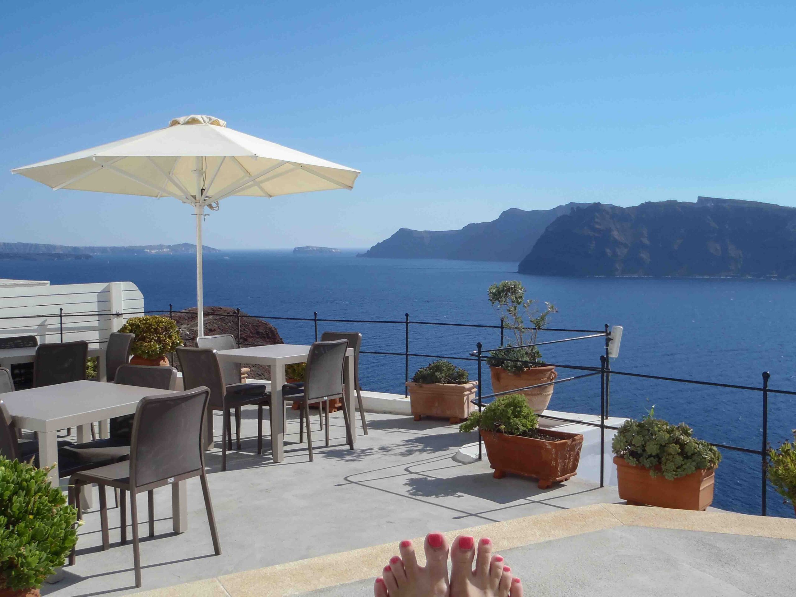Caldera views from the pool area at Esperas Santorini Hotel