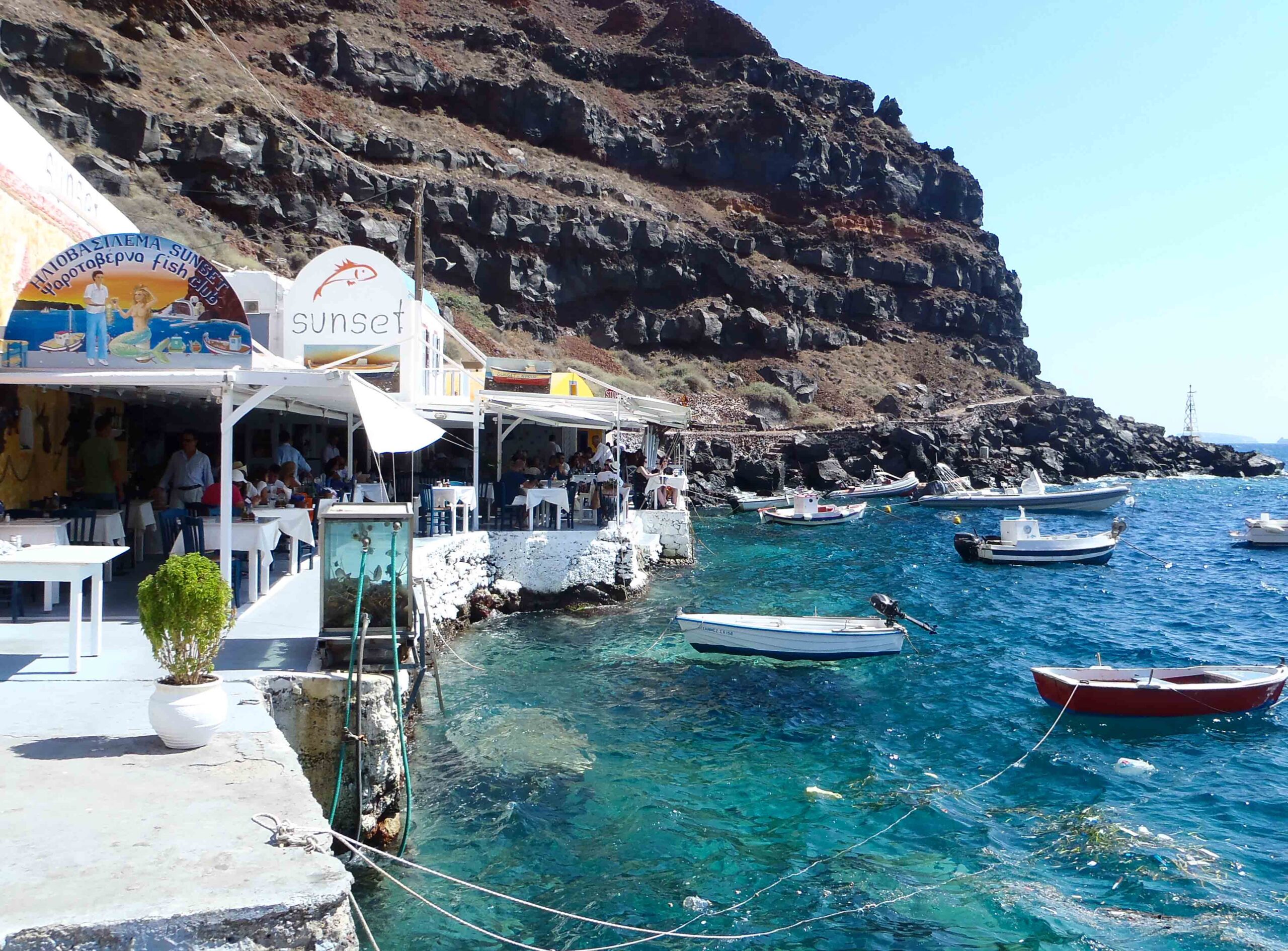 Restaurant and boats in Ammoudi Bay