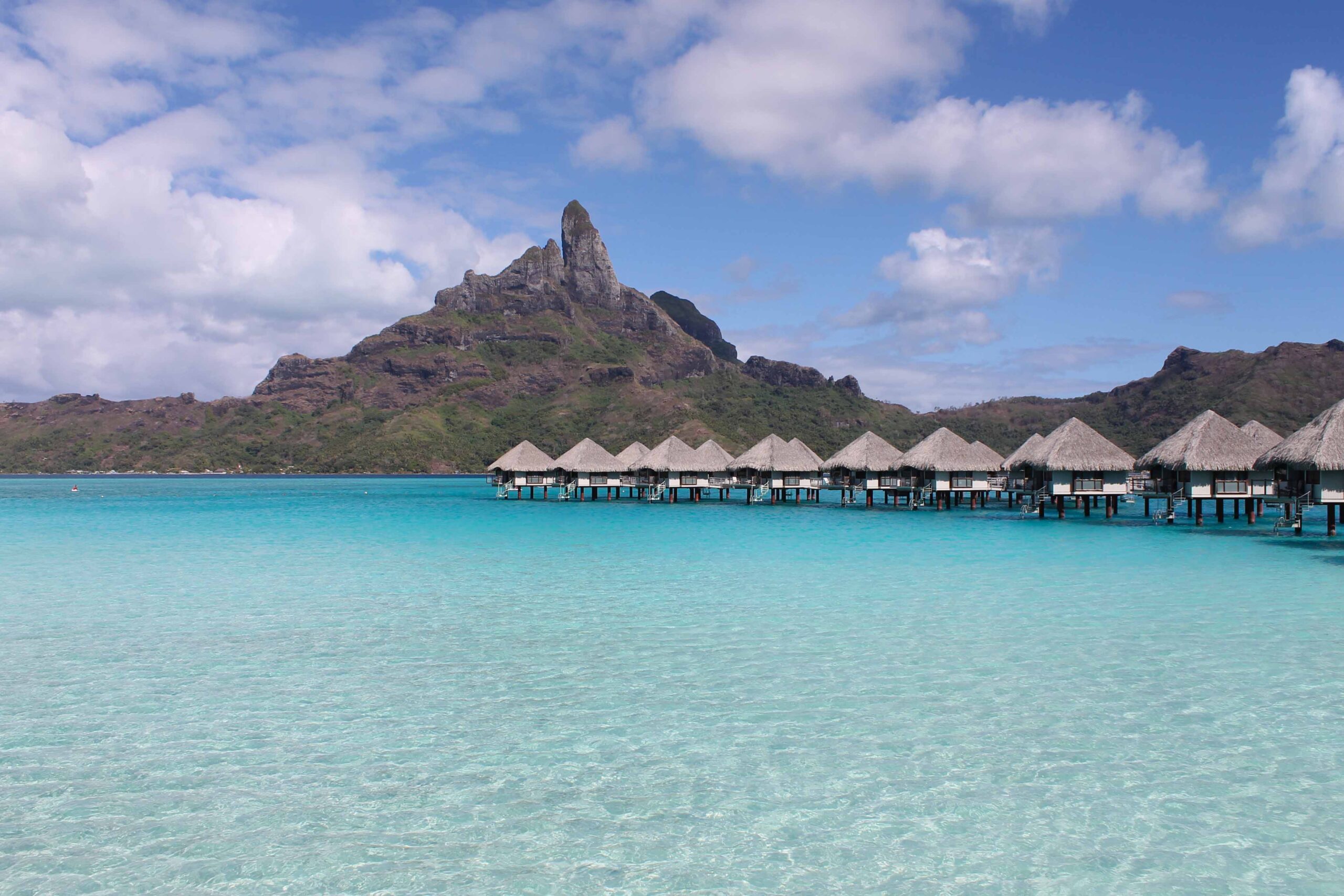 Overwater bungalows at Le Méridien Bora Bora and Mount Otemanu