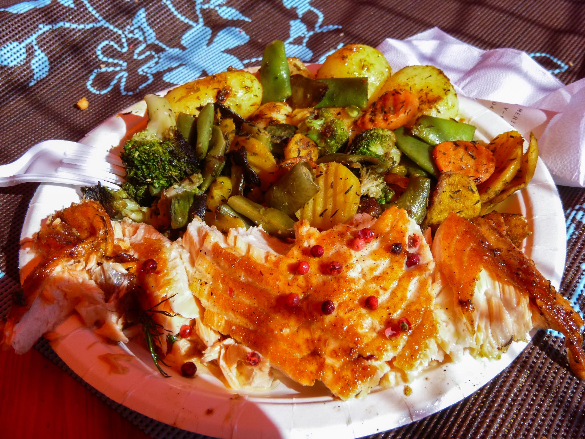 Salmon with vegetables and lingonberries from a vendor in Market Square in Helsinki