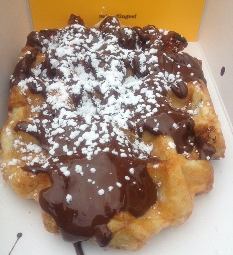 Waffle with chocolate fudge sauce and powdered sugar from the Wafels & Dinges food truck in NYC
