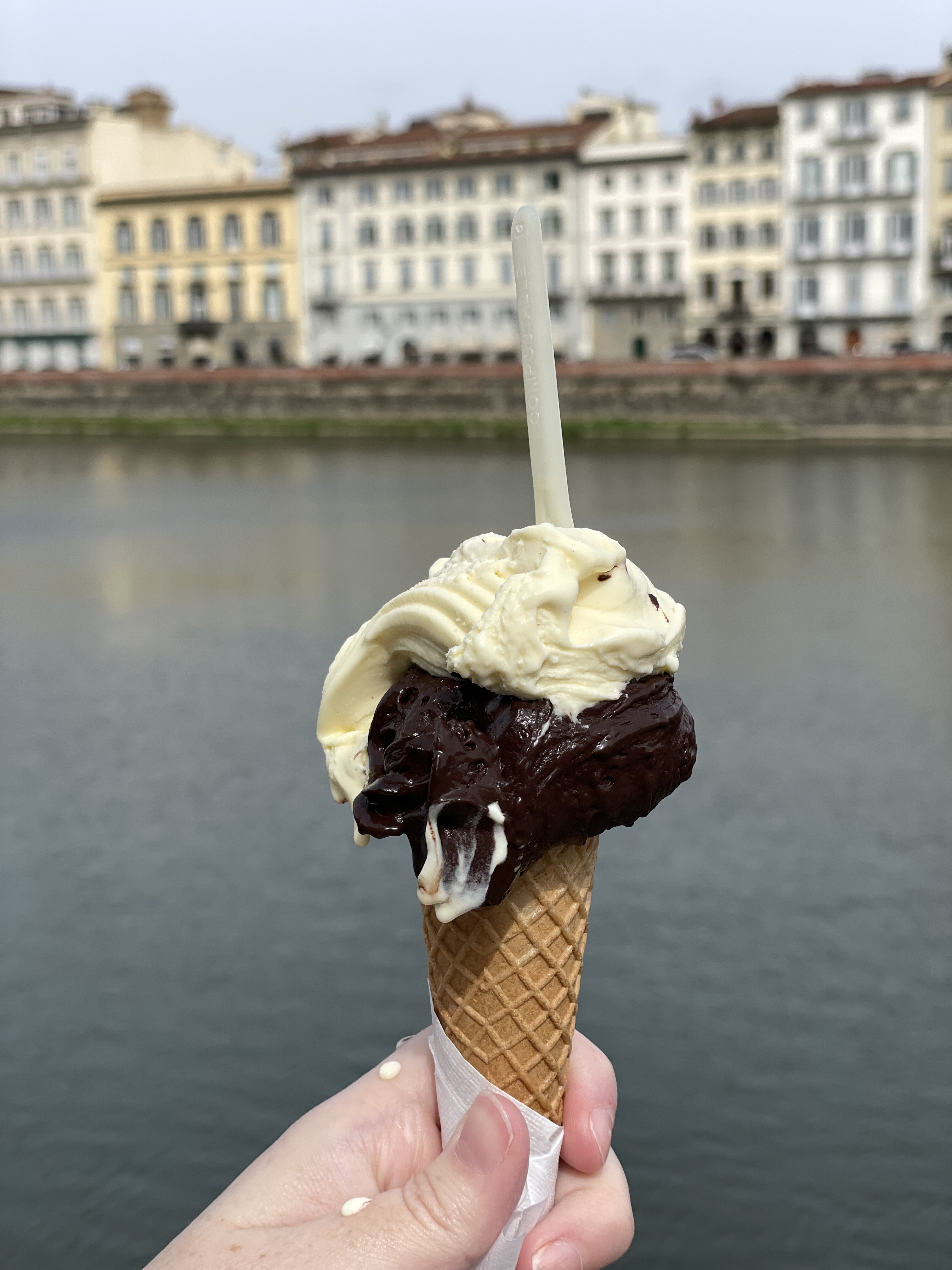 Gelato with the Arno River in the background