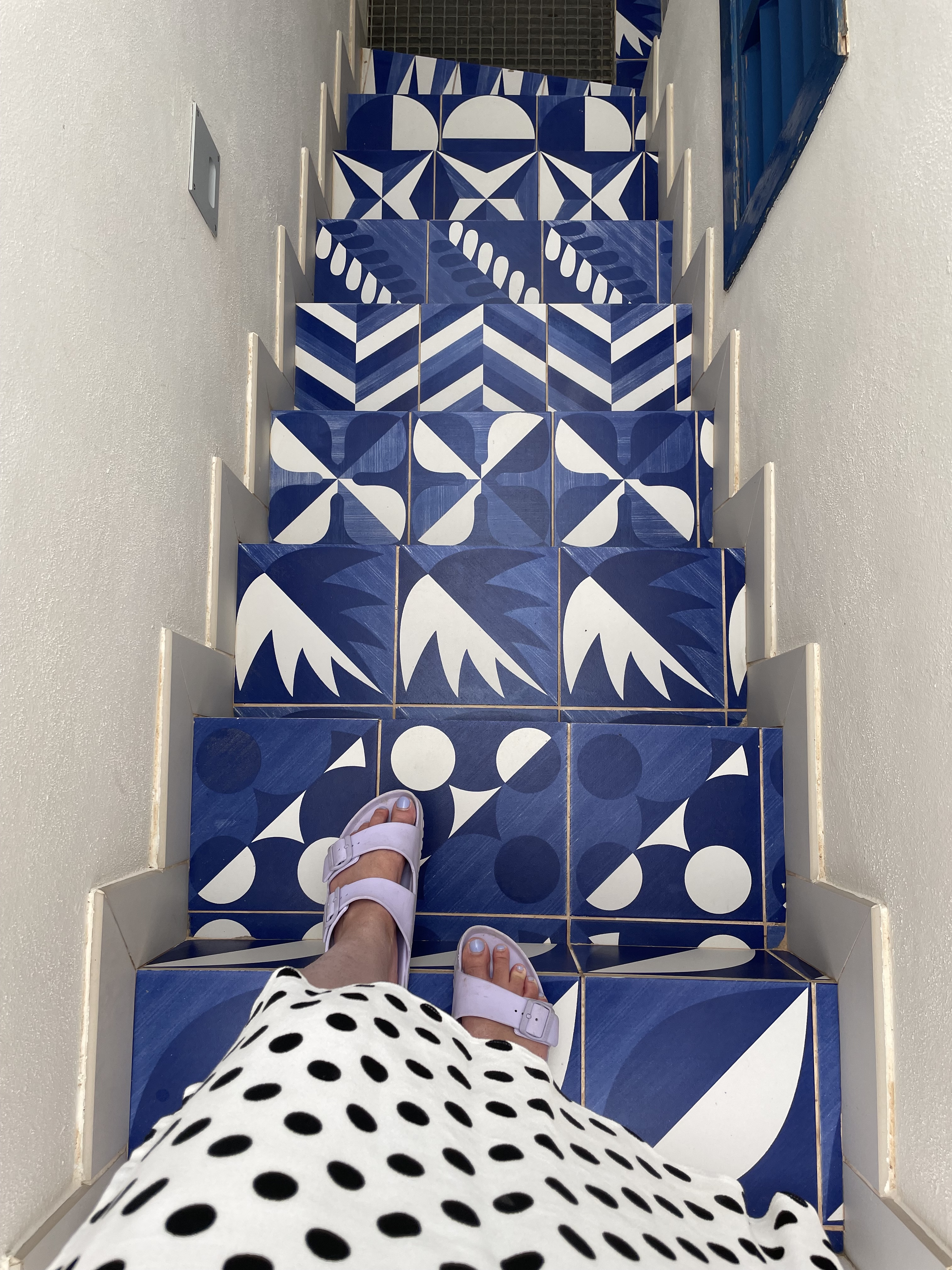 Blue and white tiling on the roofdeck at Hotel Cort