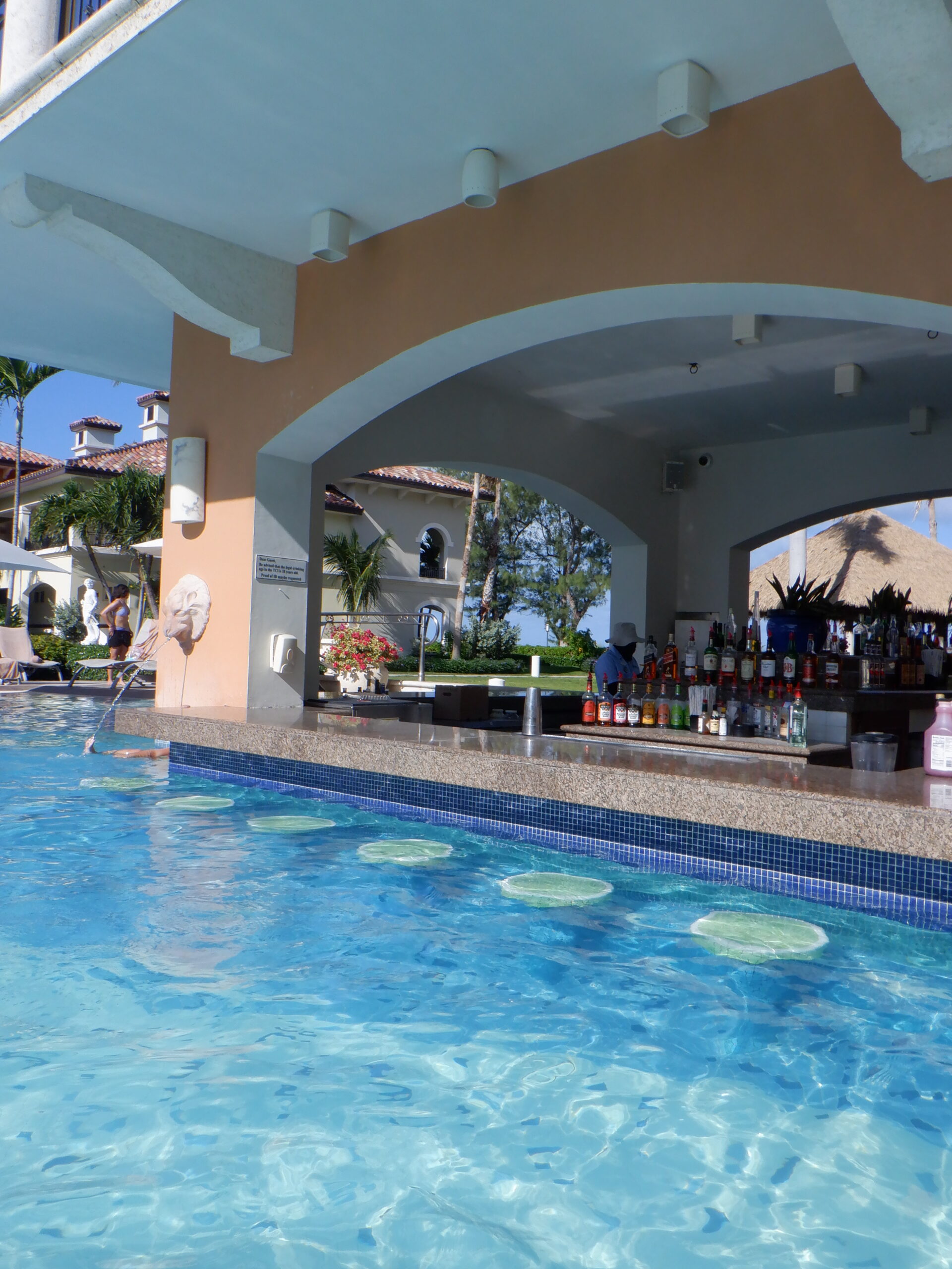 A swim-up bar in the Italian village pool at Beaches Turks and Caicos