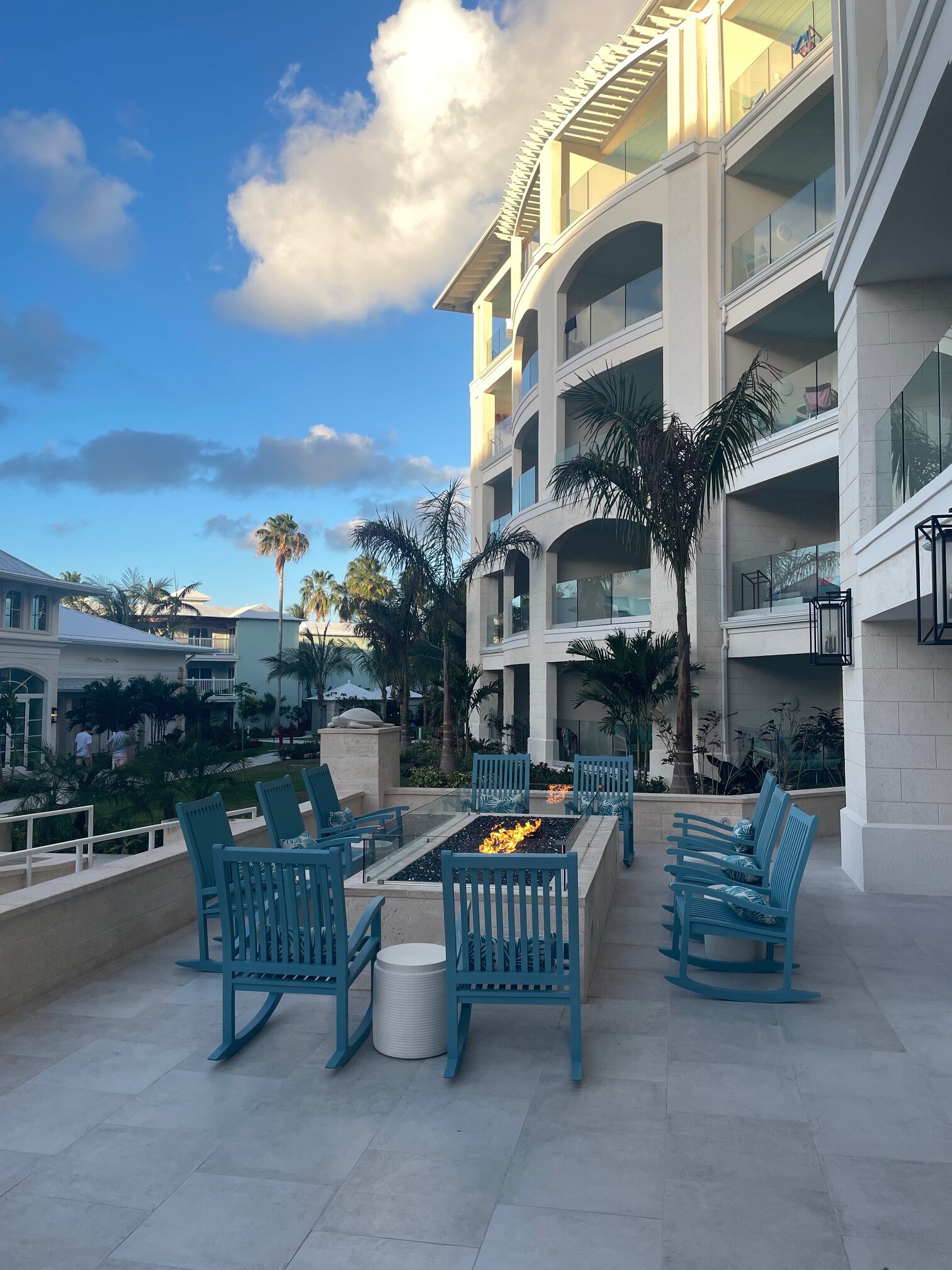 Chairs around a fire pit in Treasure Beach village