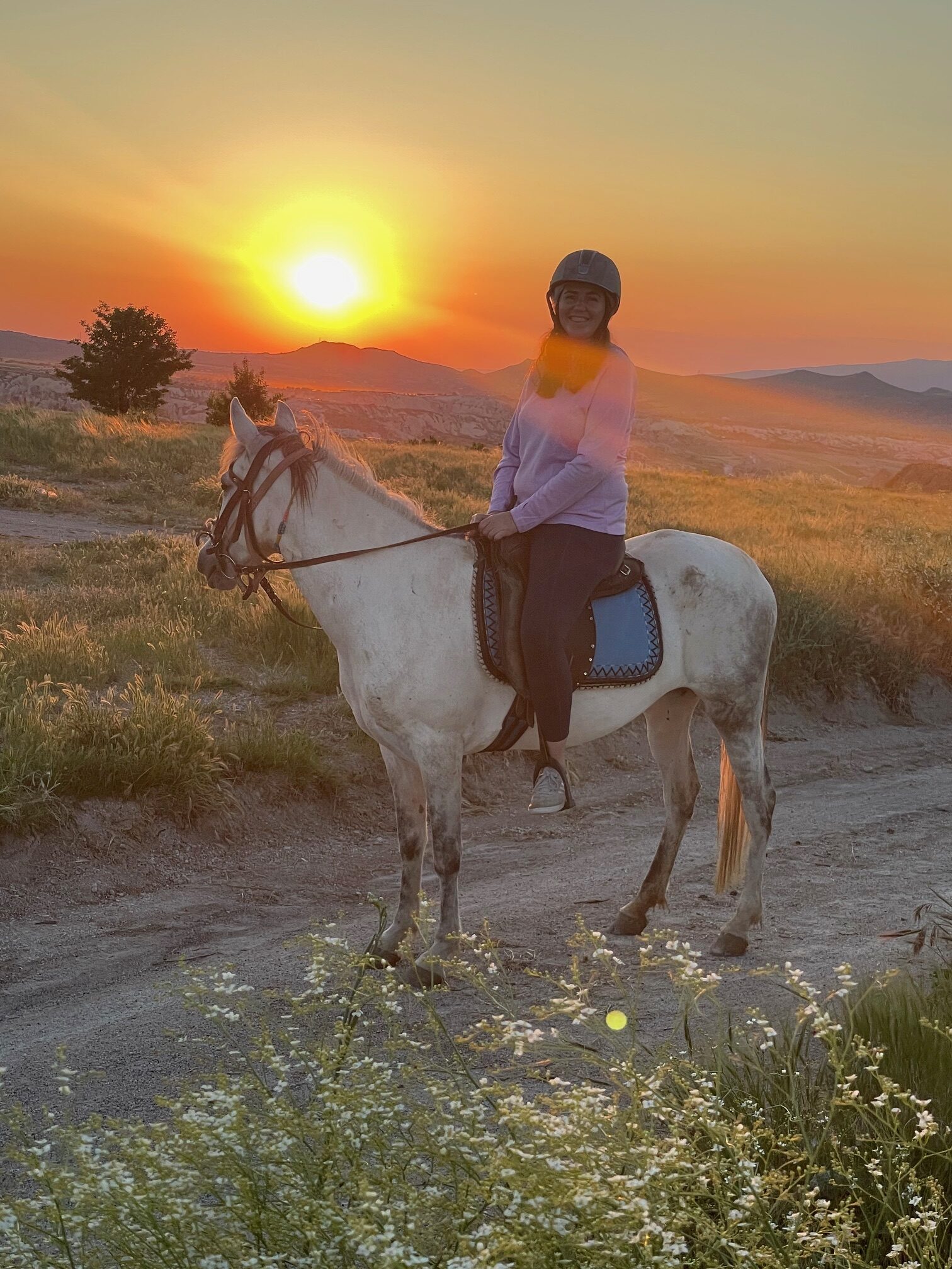 Horseback riding at sunset in Cappadocia Turkey