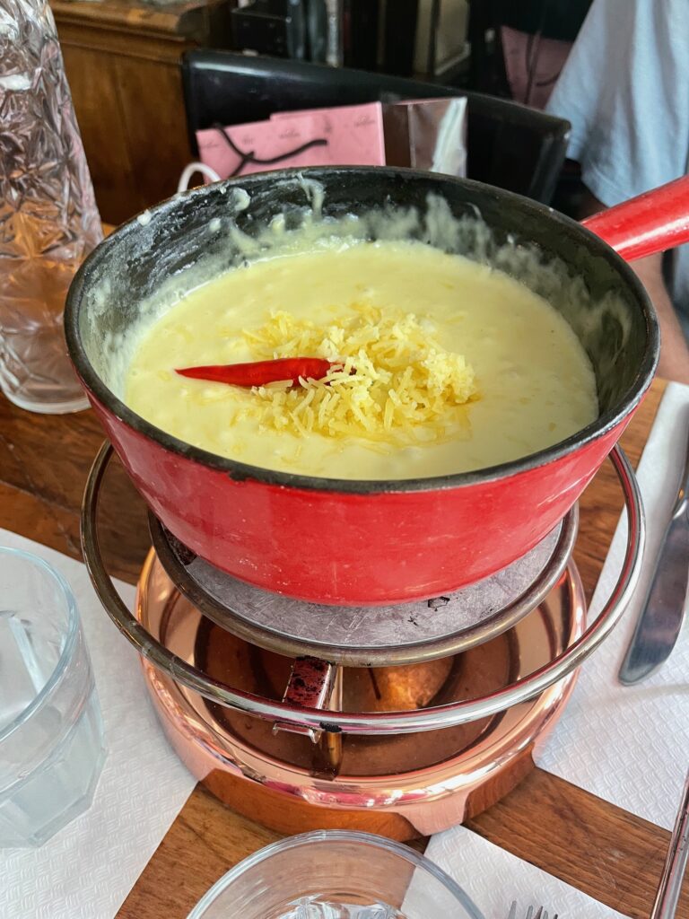 Cheese fondue at Fondue House du Pont in Lucerne, Switzerland