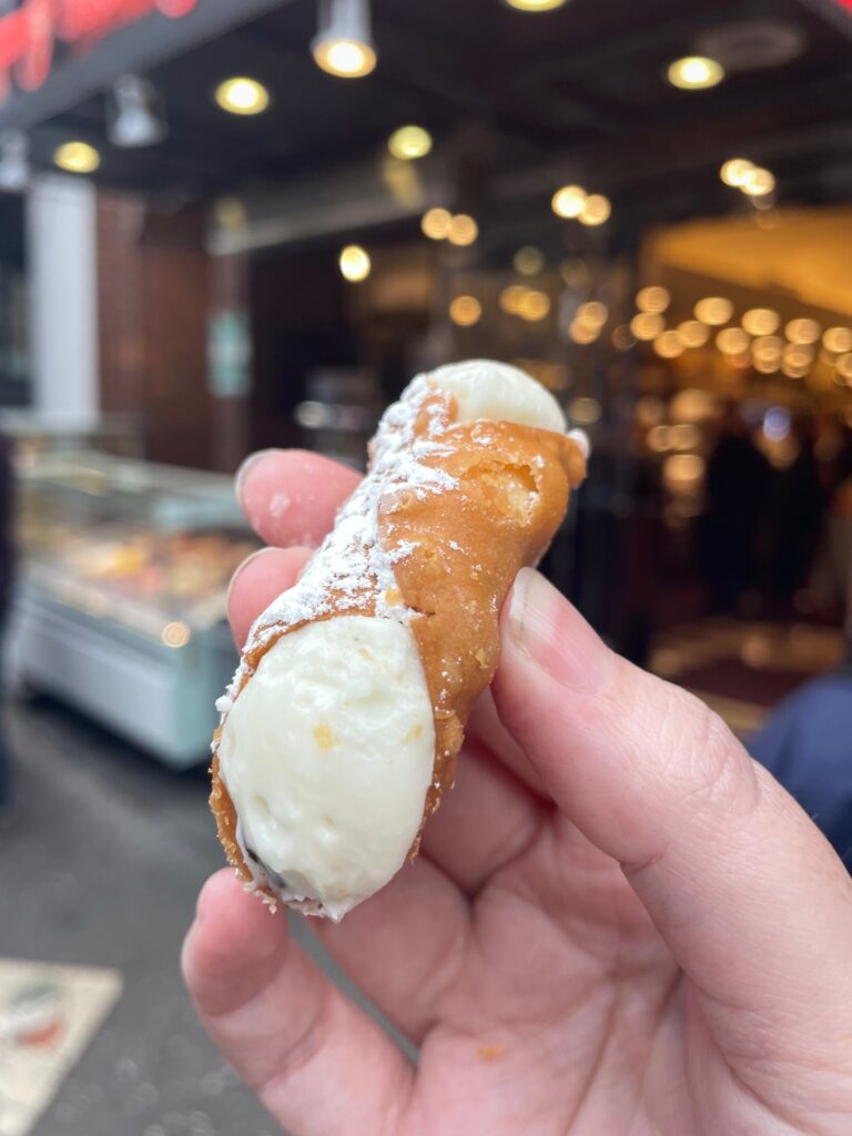 A cannoli from Ferrara Bakery, the last stop on our NYC food tour with Ahoy New York