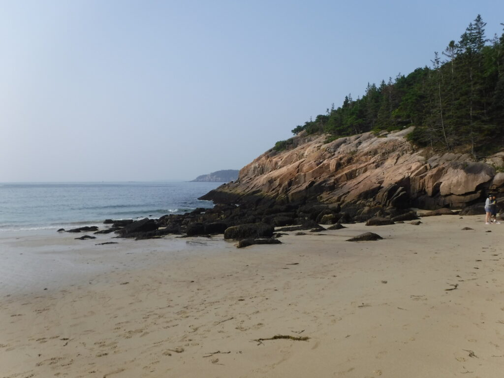 Sand Beach, the main sandy beach in Acadia National Park. Although it's too cold for swimming for many, it's a great spot for playing on the sand and exploring tidepools.